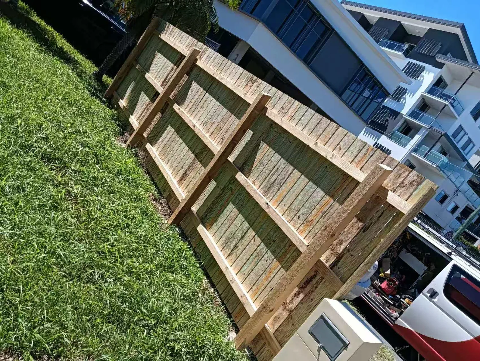 Owner-supplied photo of a timber fence section during work