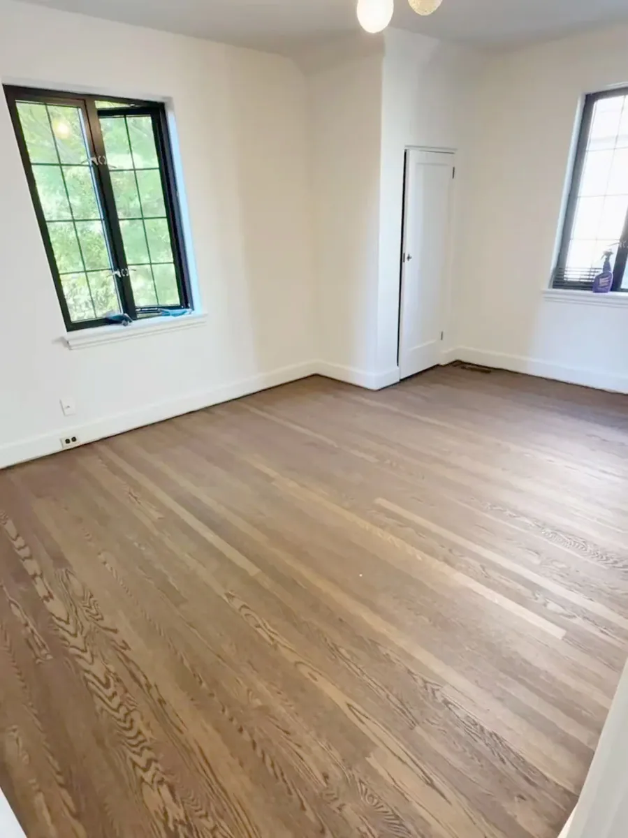 Owner-supplied photo of a timber floor in a bright empty room